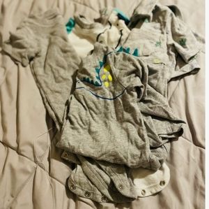 A bundle of 12 month onsies